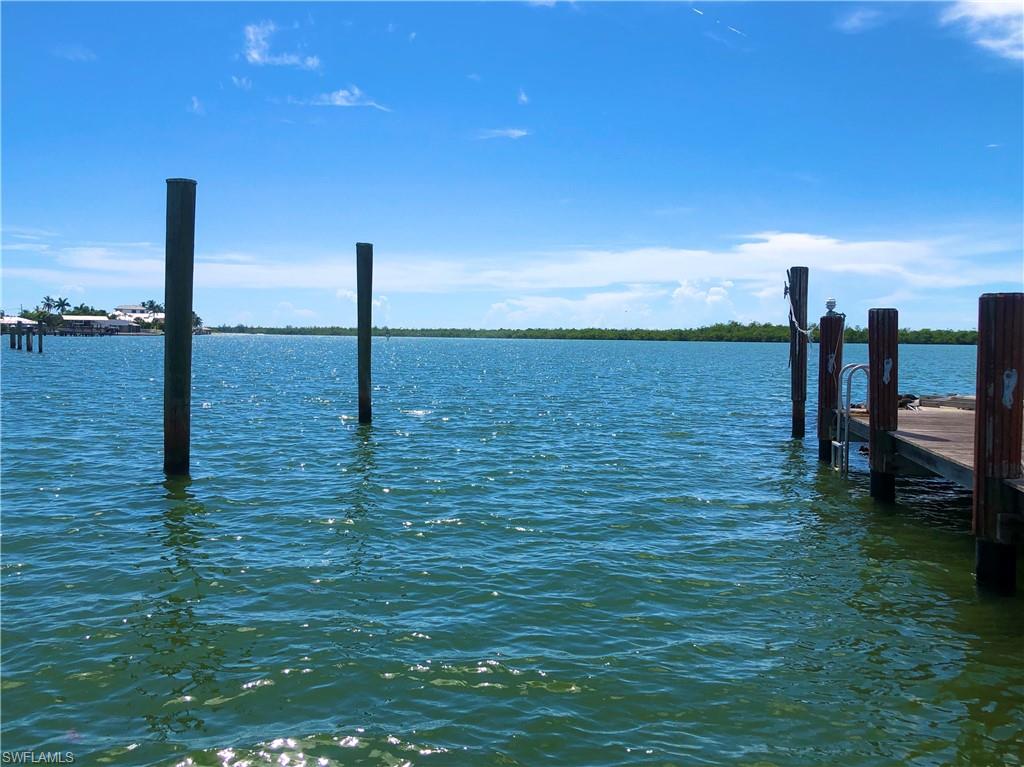 410 Cristobal Street Naples, FL 34113 - Photo 30 of 50 a ocean view with beach