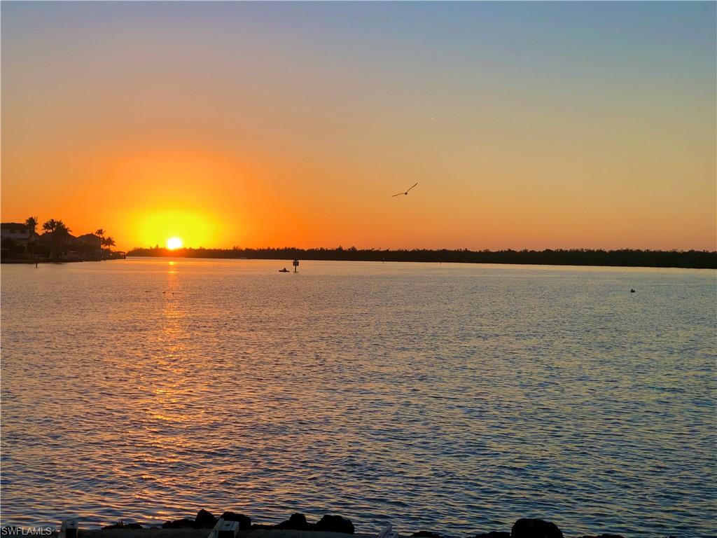 410 Cristobal Street Naples, FL 34113 - Photo 31 of 50 a view of an ocean