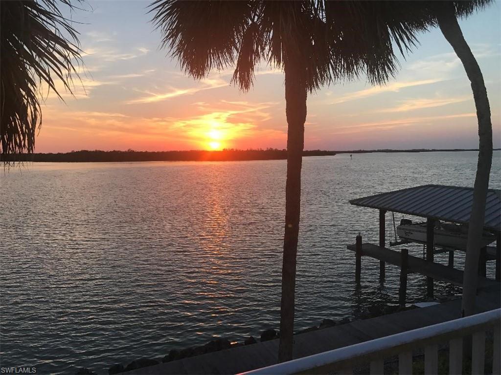 410 Cristobal Street Naples, FL 34113 - Photo 34 of 50 a view of a lake