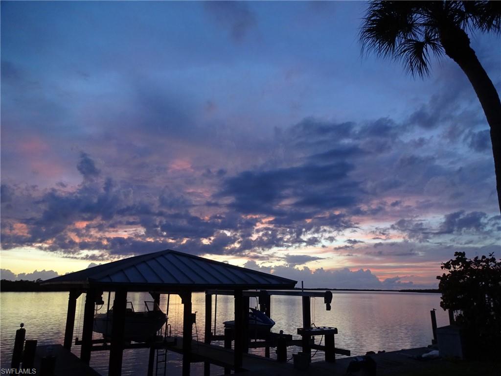 410 Cristobal Street Naples, FL 34113 - Photo 39 of 50 a view of a swimming pool from a balcony