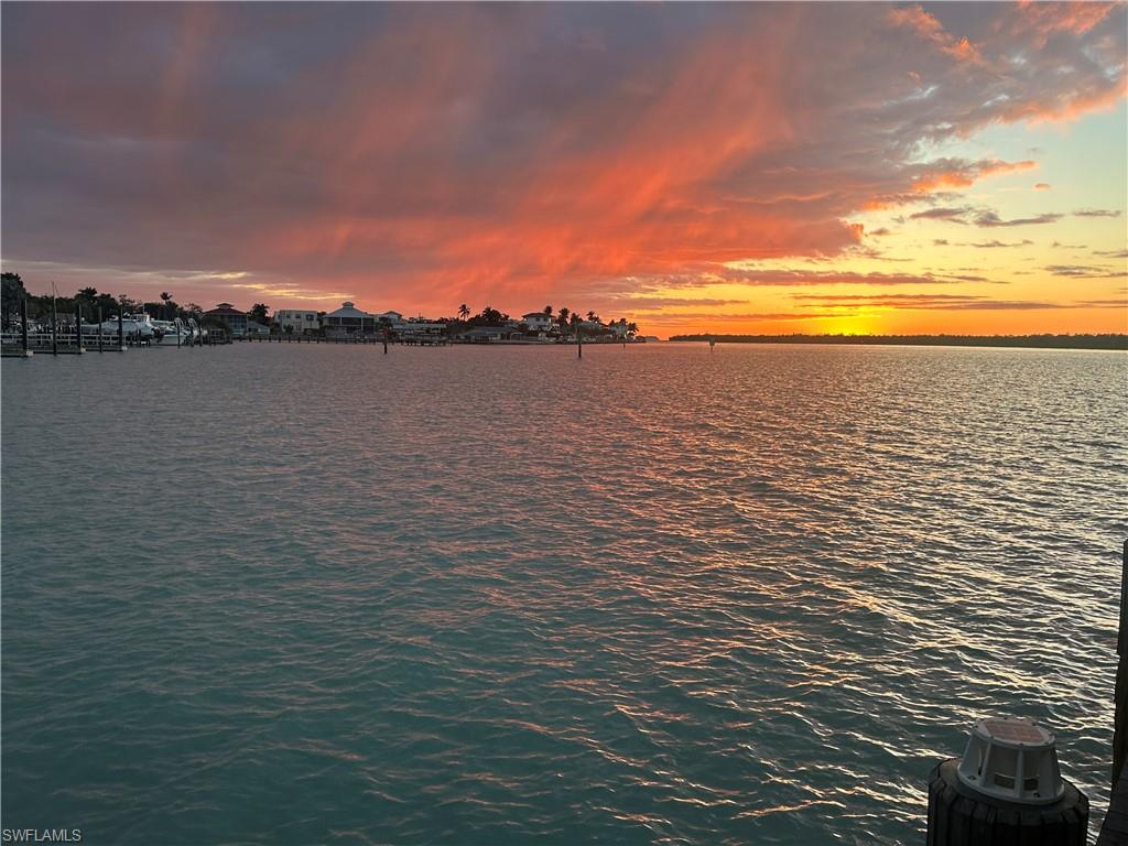 410 Cristobal Street Naples, FL 34113 - Photo 47 of 50 a view of a lake view
