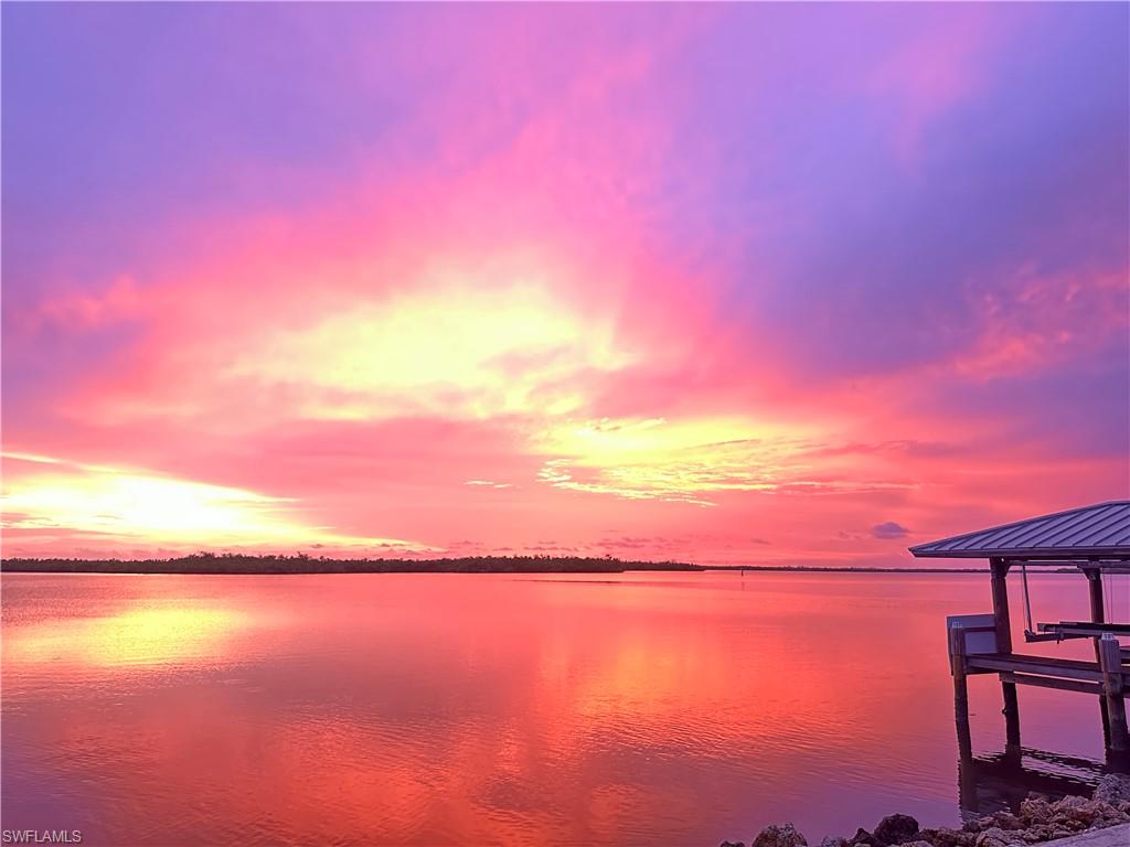 410 Cristobal Street Naples, FL 34113 - Photo 50 of 50 a view of lake and mountain
