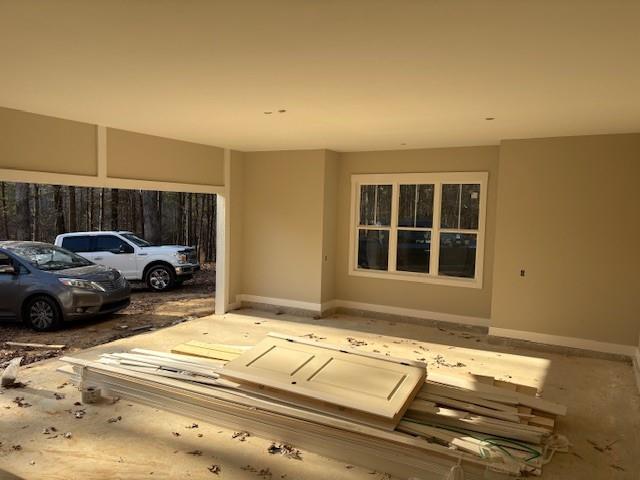 2075 Jerusalem Church Road Jasper, GA 30143 - Photo 11 of 14 a view of a livingroom with furniture and floor to ceiling window