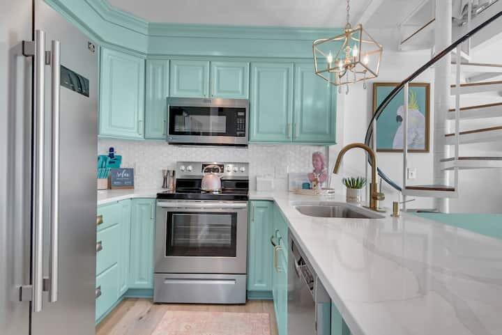 32461 East County Highway 30A, Unit 17 Inlet Beach, FL 32461 - Photo 12 of 53 a kitchen with stainless steel appliances granite countertop a sink and a refrigerator