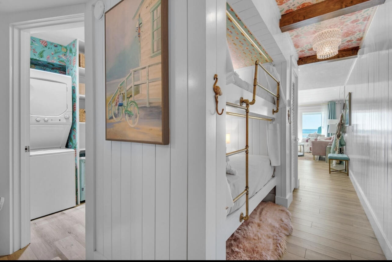 32461 East County Highway 30A, Unit 17 Inlet Beach, FL 32461 - Photo 24 of 53 a view of a hallway with wooden floor and living room