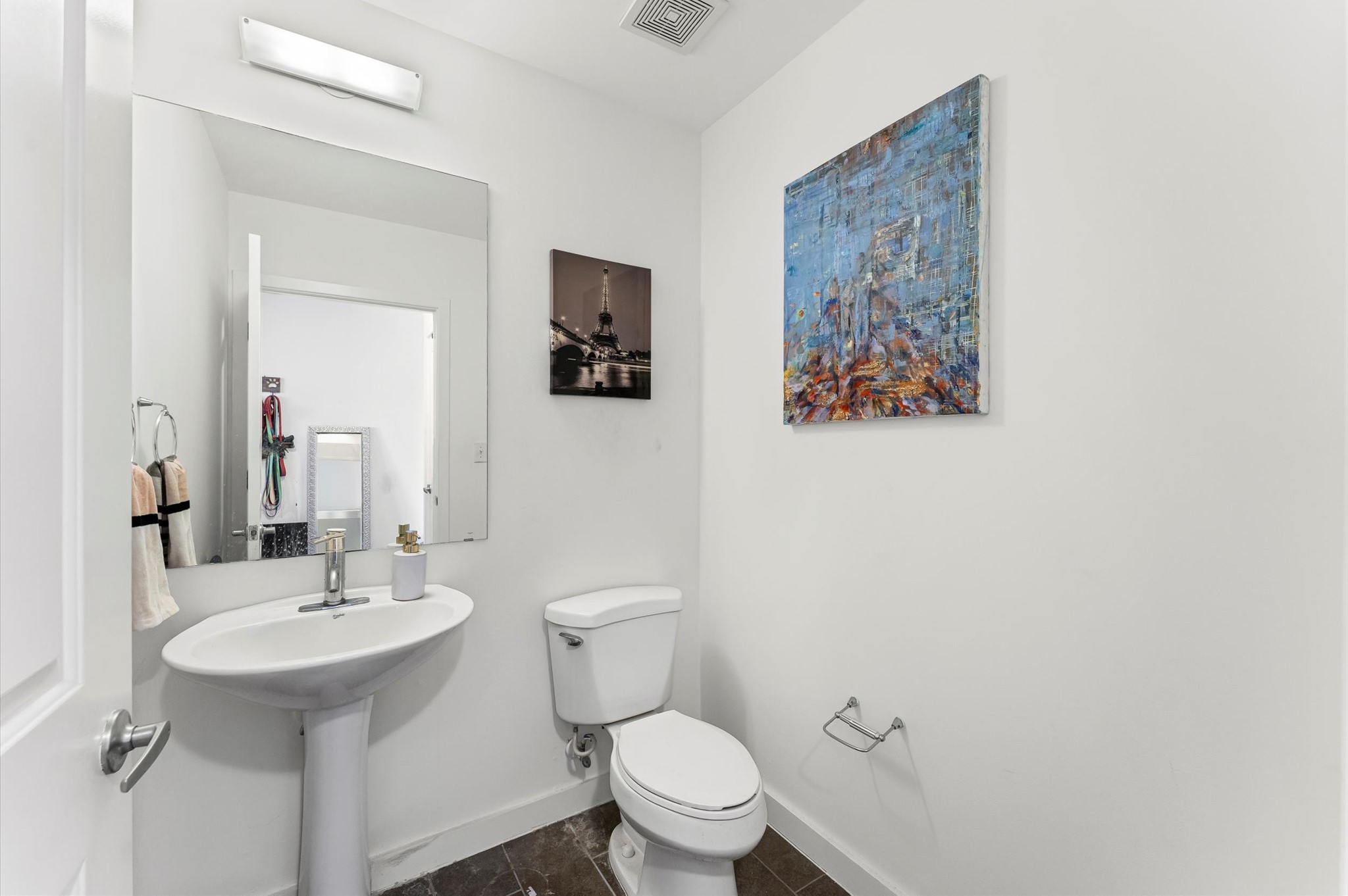 5925 Almeda Road, Unit 11315 Houston, TX 77004 - Photo 11 of 31 a bathroom with a toilet sink and mirror
