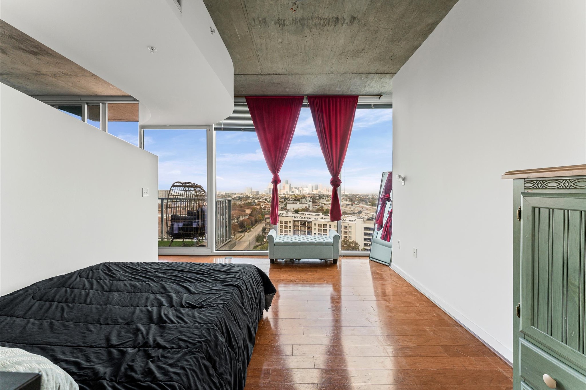 5925 Almeda Road, Unit 11315 Houston, TX 77004 - Photo 12 of 31 a bedroom with a bed and large windows