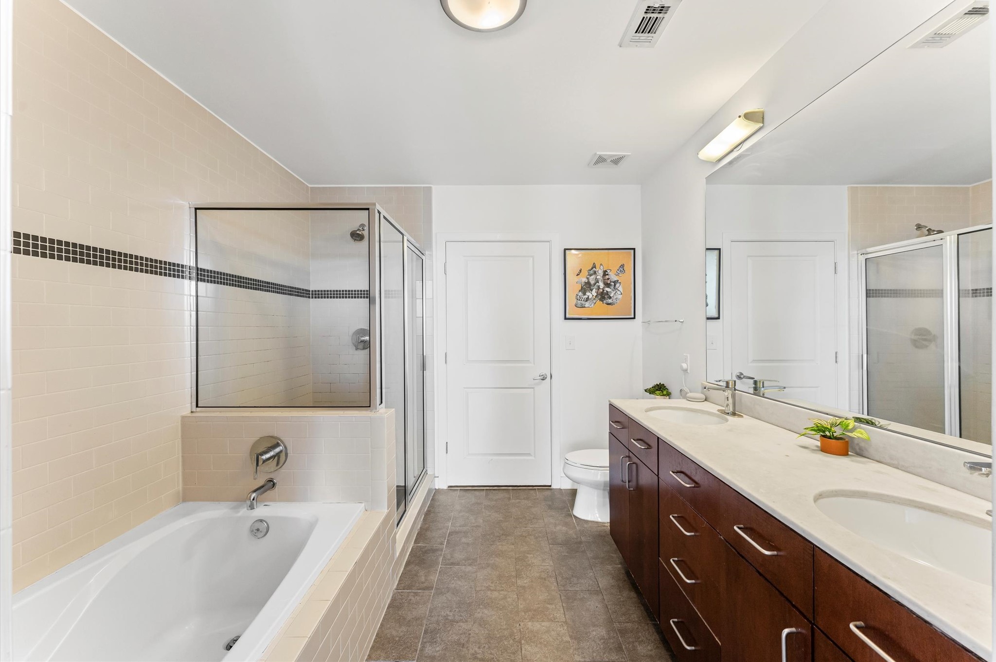 5925 Almeda Road, Unit 11315 Houston, TX 77004 - Photo 14 of 31 a spacious bathroom with a tub sink shower and mirror