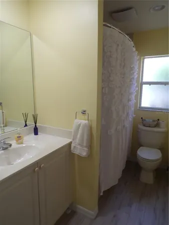 a bathroom with a sink and toilet