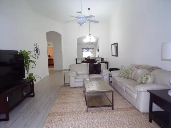 a living room with furniture and a couch