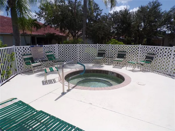 a view of a chairs and tables in the patio