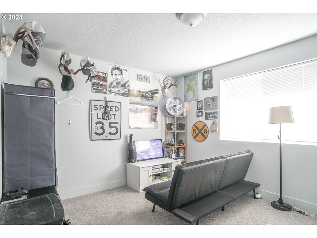 213 Oak Street Winlock, WA 98596 - Photo 26 of 32 a living room with a couch and a table