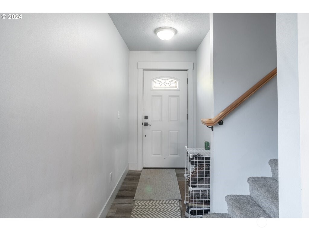 213 Oak Street Winlock, WA 98596 - Photo 10 of 32 a view of entryway with wooden floor