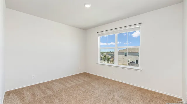 an empty room with a window