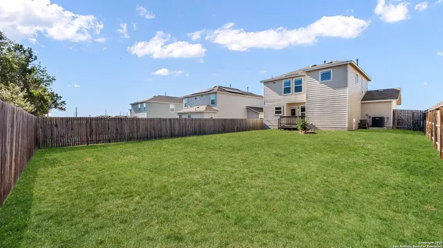 a view of a backyard with a garden