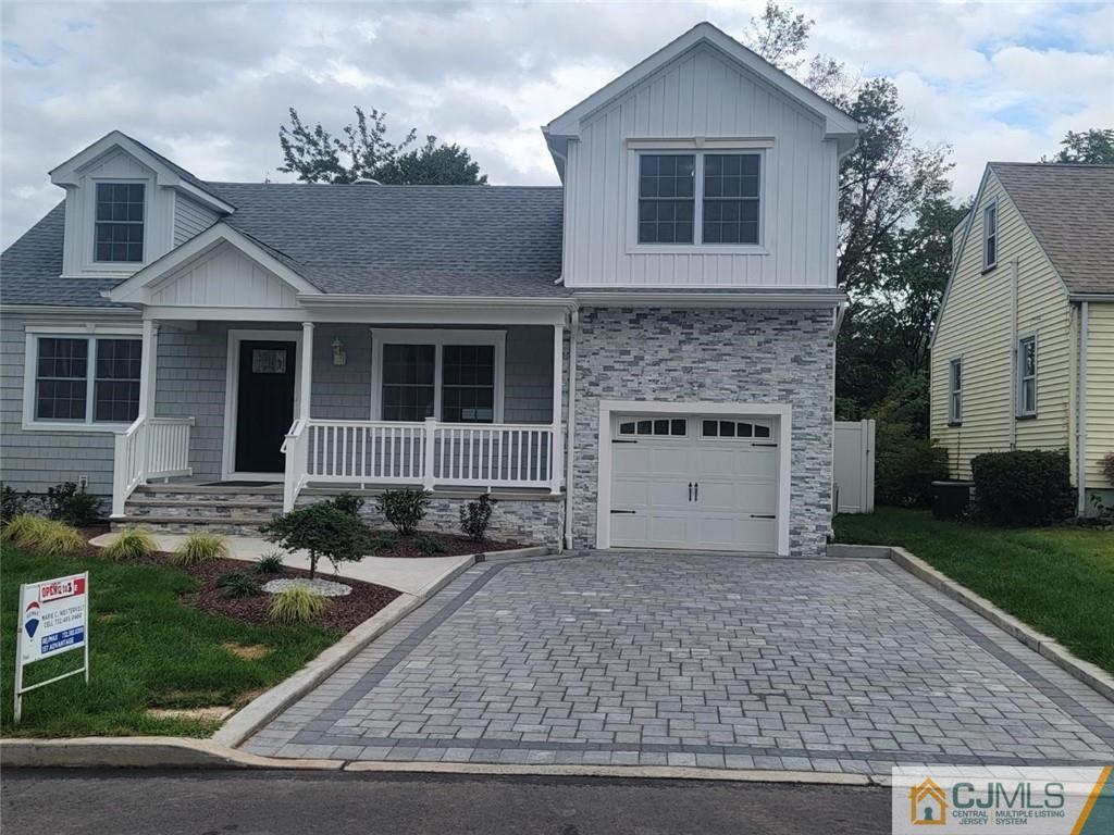 32 Middle Hill Road Colonia, NJ 07067 - Photo 1 of 21 front view of a house with a yard