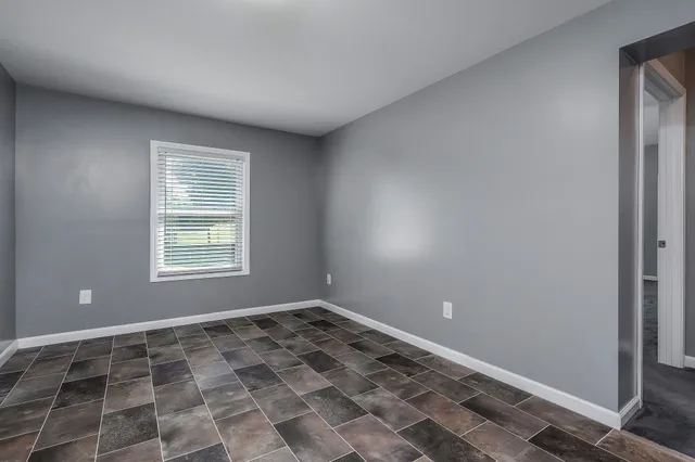 a view of a room with a window