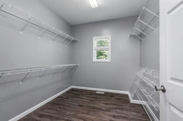 a view of a room with racks on the wall