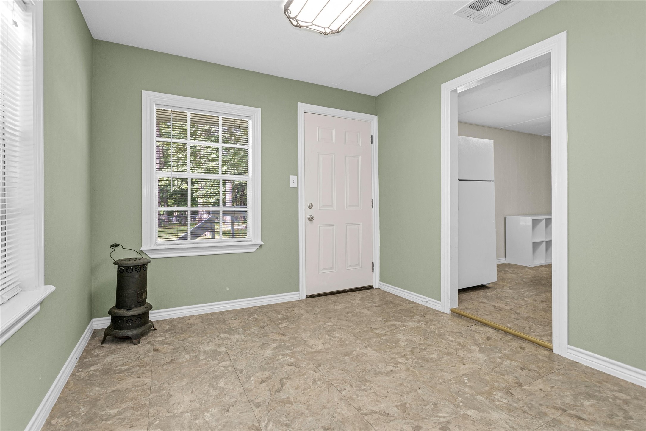 99 Main Street Huntsville, TX 77340 - Photo 16 of 47 It provides a private entrance into the home, perfect for running a small business.