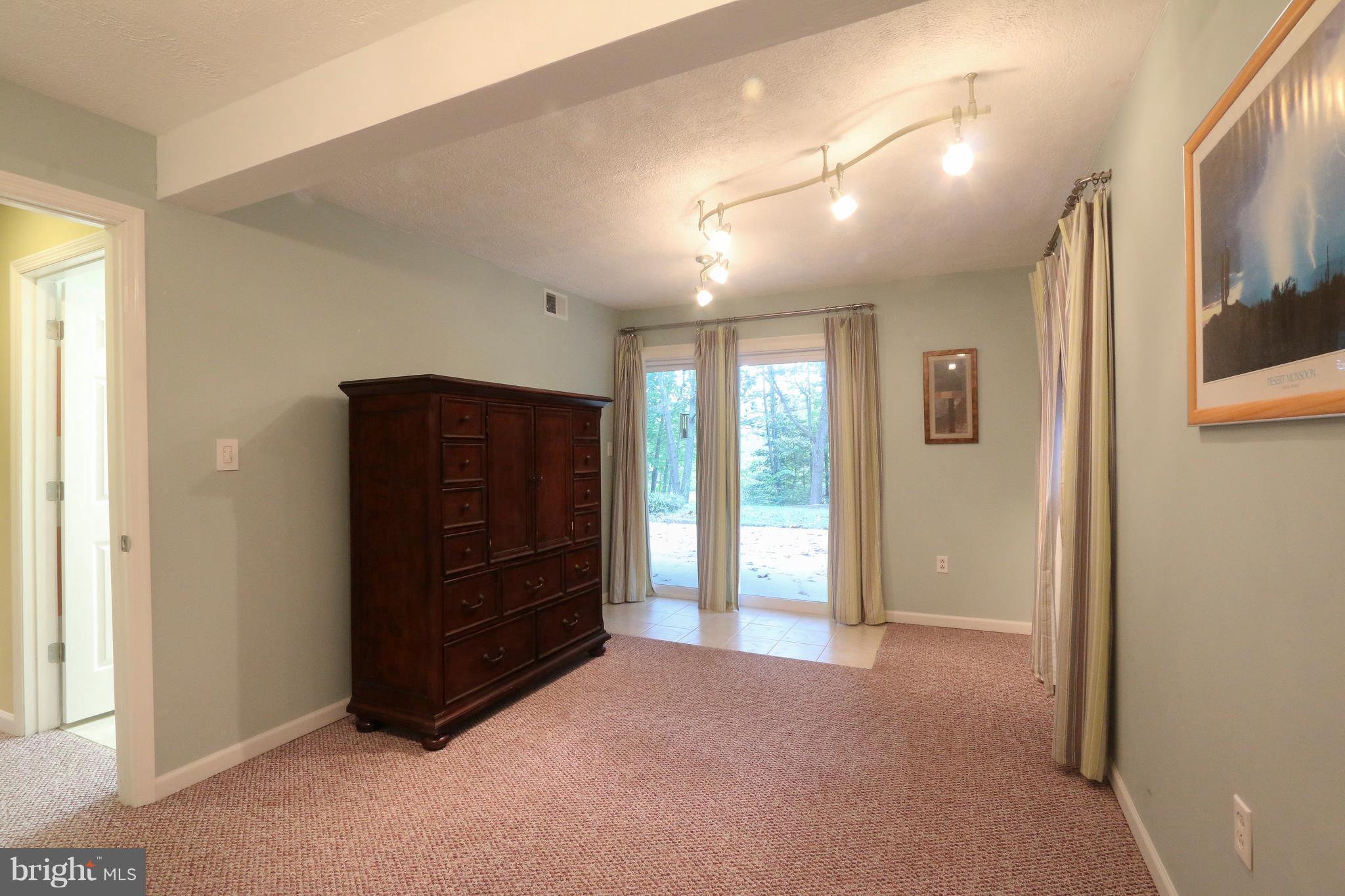 815 Big Road Lusby, MD 20657 - Photo 25 of 29 Lower Level Bedroom