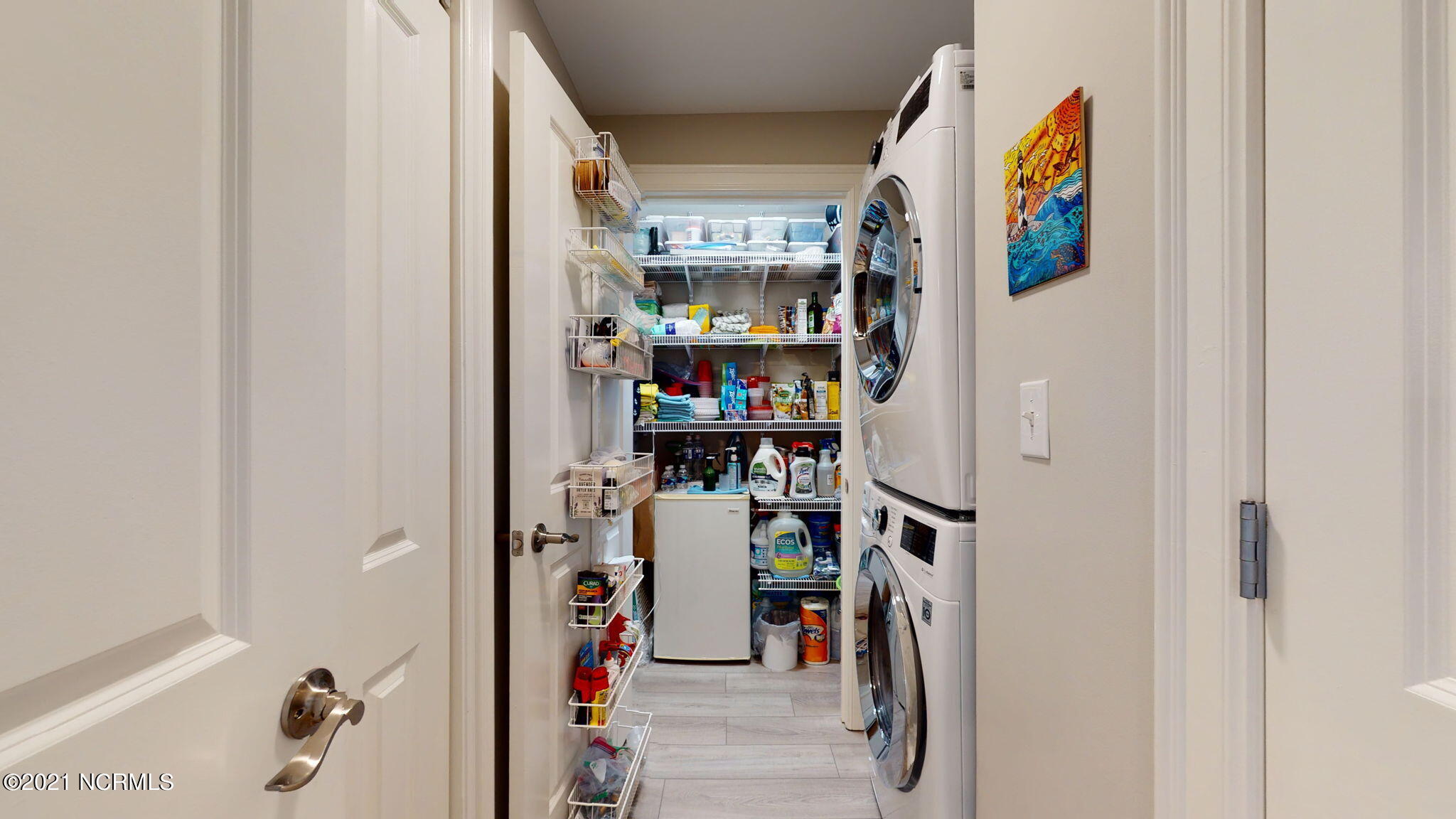 1550 Salter Path Road, Unit 302 Indian Beach, NC 28512 - Photo 15 of 49 pantry/washer and dryer