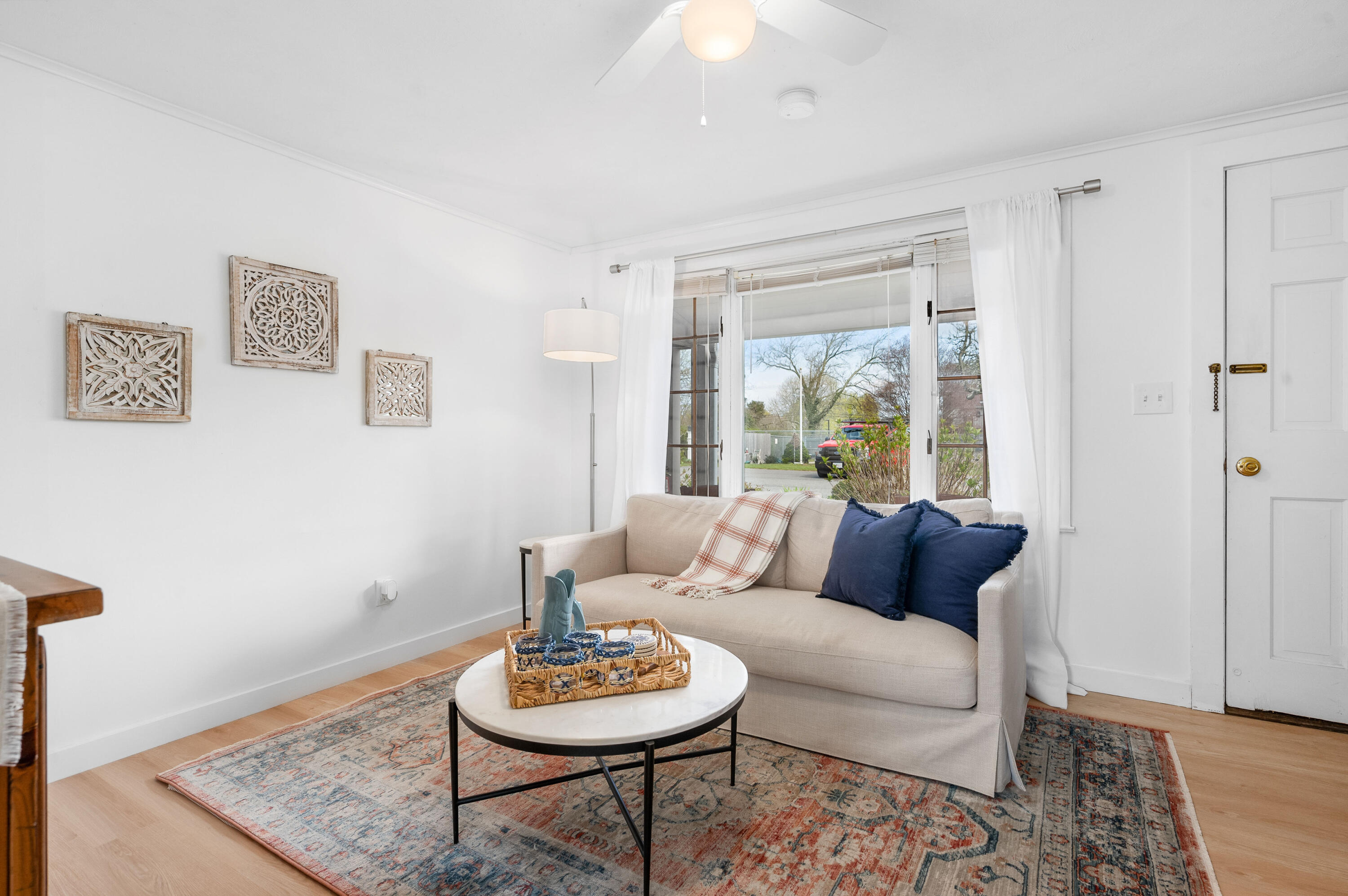 405 Lower County Road, Unit 23C Harwich Port, MA 02646 - Photo 5 of 17 a living room with furniture and a window