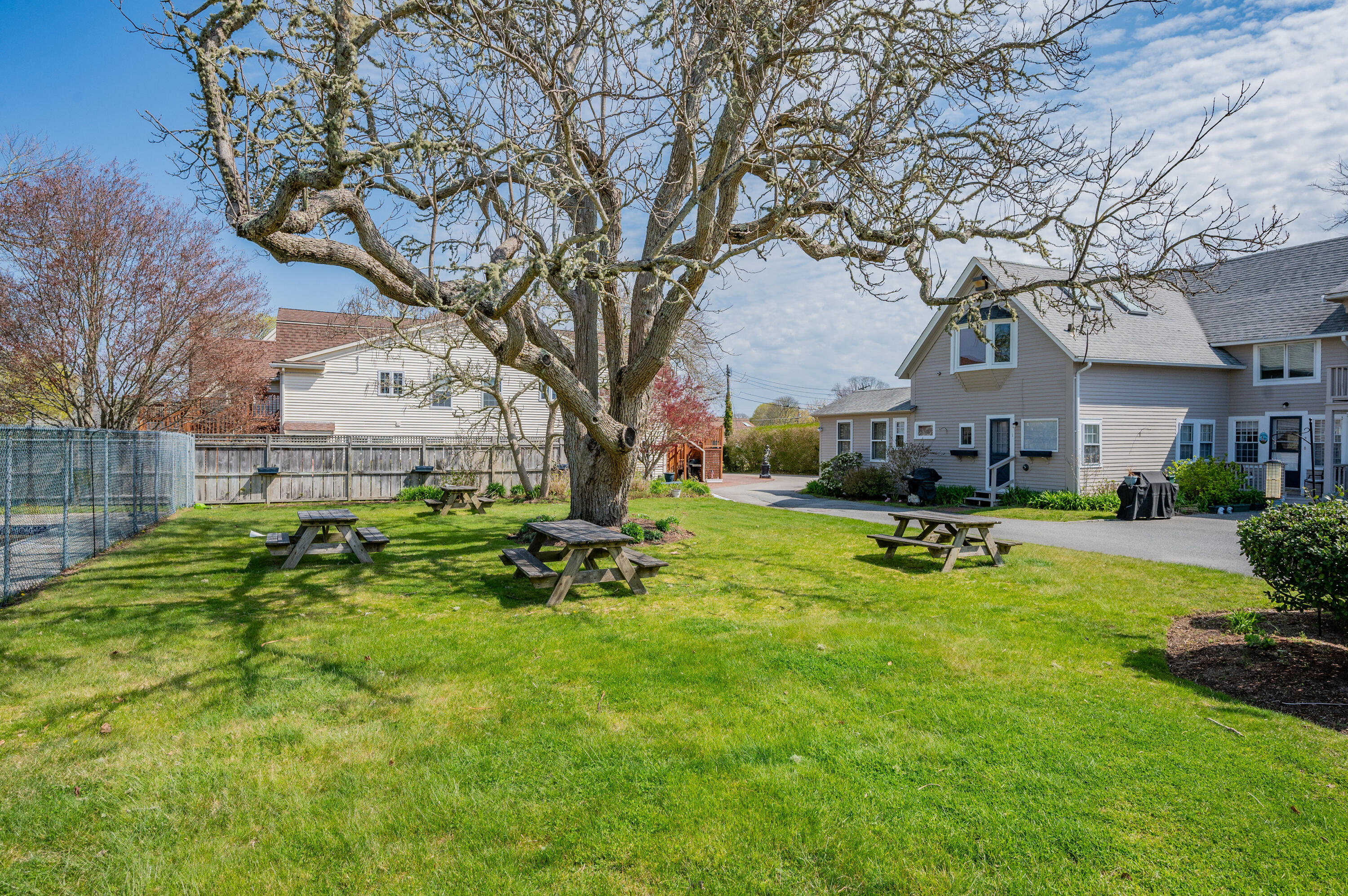 405 Lower County Road, Unit 23C Harwich Port, MA 02646 - Photo 10 of 17 a view of a house with pool and sitting area