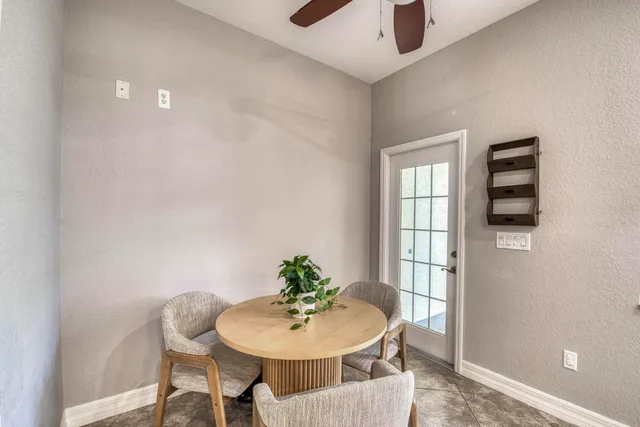 a sign that is in front of flowers