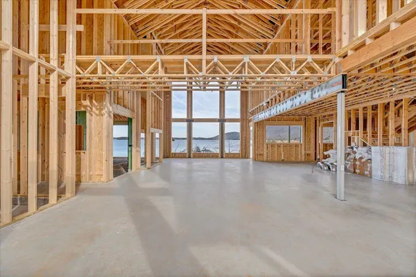 a view of houses with water and pool