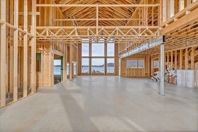 a view of houses with water and pool