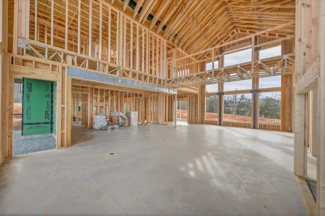 a view of swimming pool with lake view and mountain in the back