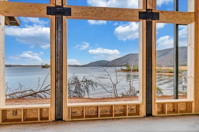 a black and white photo of a living room