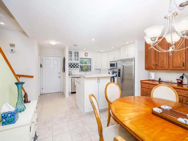 a bedroom with a bed and a television