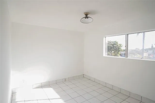 a bathroom with a shower and a toilet