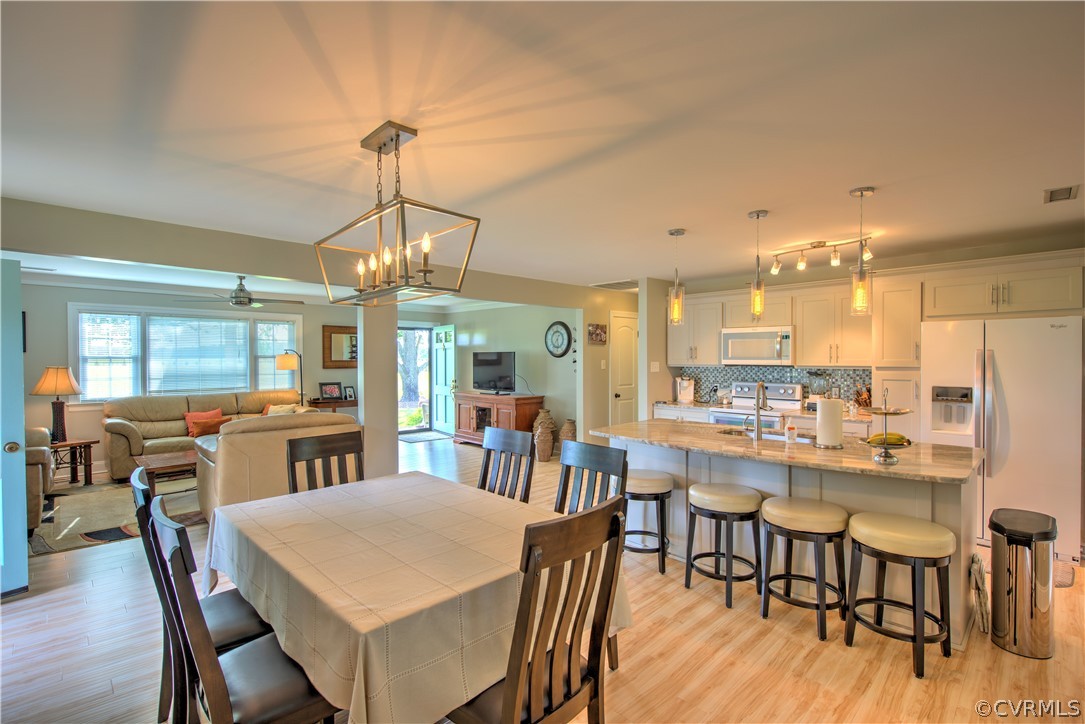 13480 Independence Road Ashland, VA 23005 - Photo 13 of 28 a view of a dining room with furniture window and wooden floor