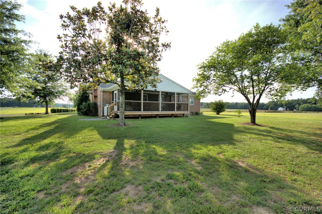 13480 Independence Road Ashland, VA 23005 - Photo 22 of 28 a view of a house with a big yard and garden