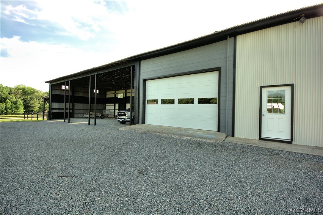 13480 Independence Road Ashland, VA 23005 - Photo 25 of 28 a view of a house with a garage