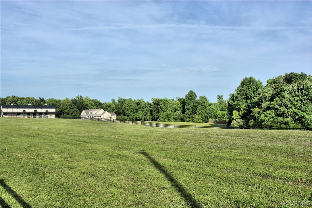 13480 Independence Road Ashland, VA 23005 - Photo 27 of 28 a view of a field with an trees in front of it