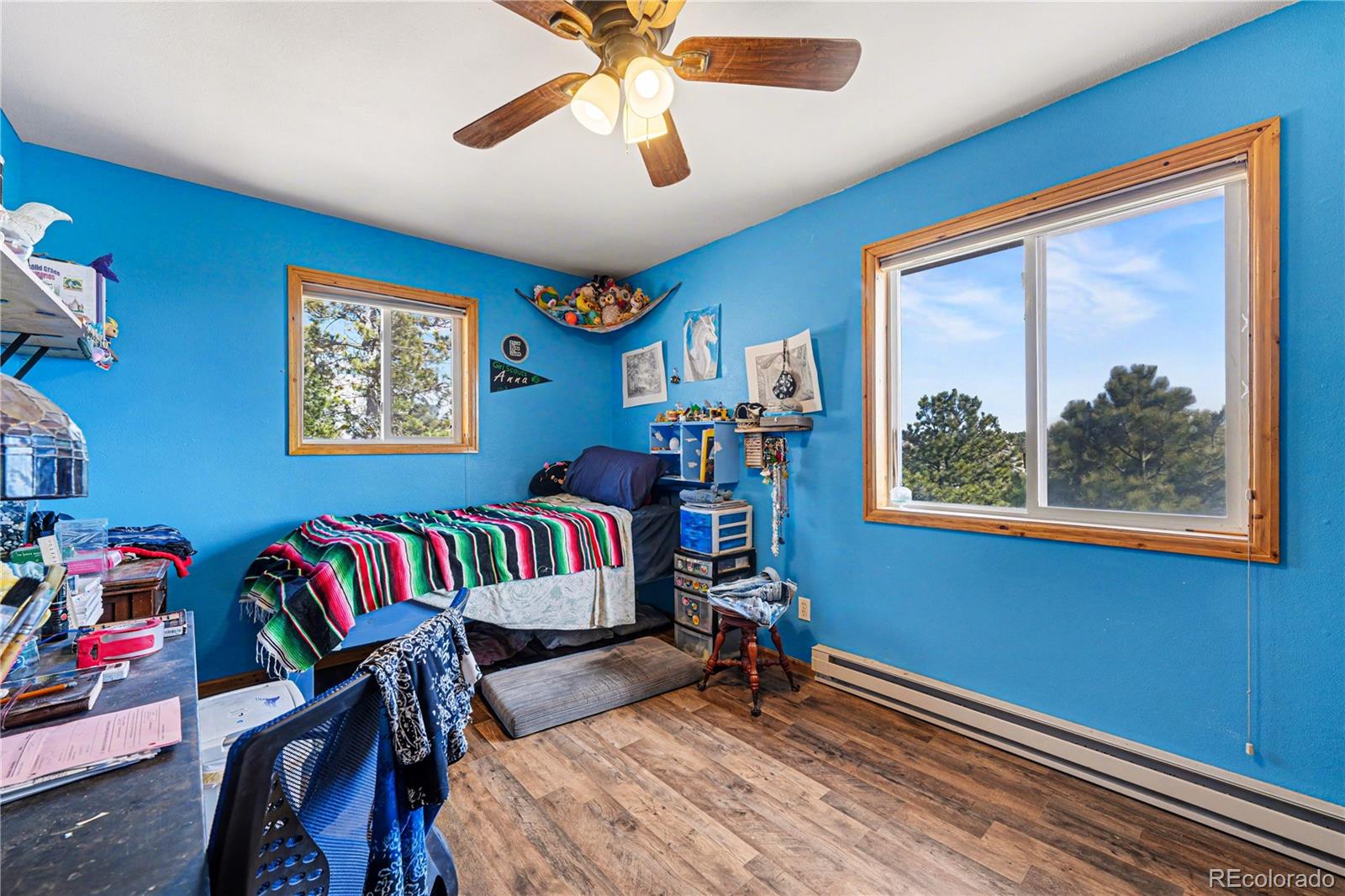 319 Springmeadow Way Red Feather Lakes, CO 80545 - Photo 11 of 30 a bedroom with furniture and a rug