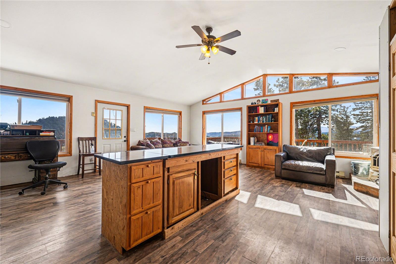 319 Springmeadow Way Red Feather Lakes, CO 80545 - Photo 3 of 30 a living room with furniture and a large window