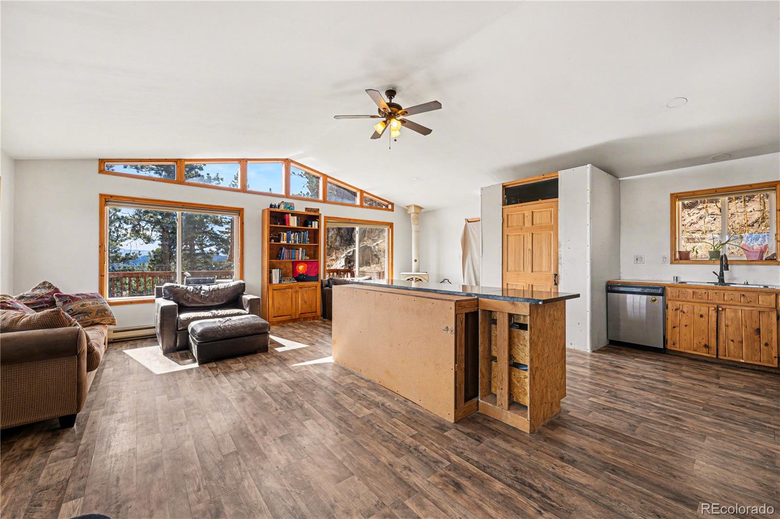 319 Springmeadow Way Red Feather Lakes, CO 80545 - Photo 8 of 30 a living room with furniture and a large window