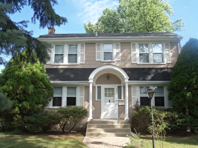 460 Selborne Road Riverside, IL 60546 - Photo 1 of 25 a front view of a house with a yard