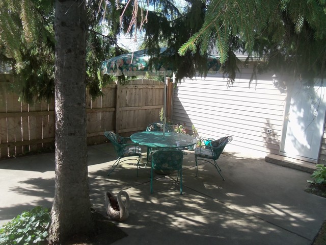 460 Selborne Road Riverside, IL 60546 - Photo 25 of 25 a view of a bench in the backyard of a house