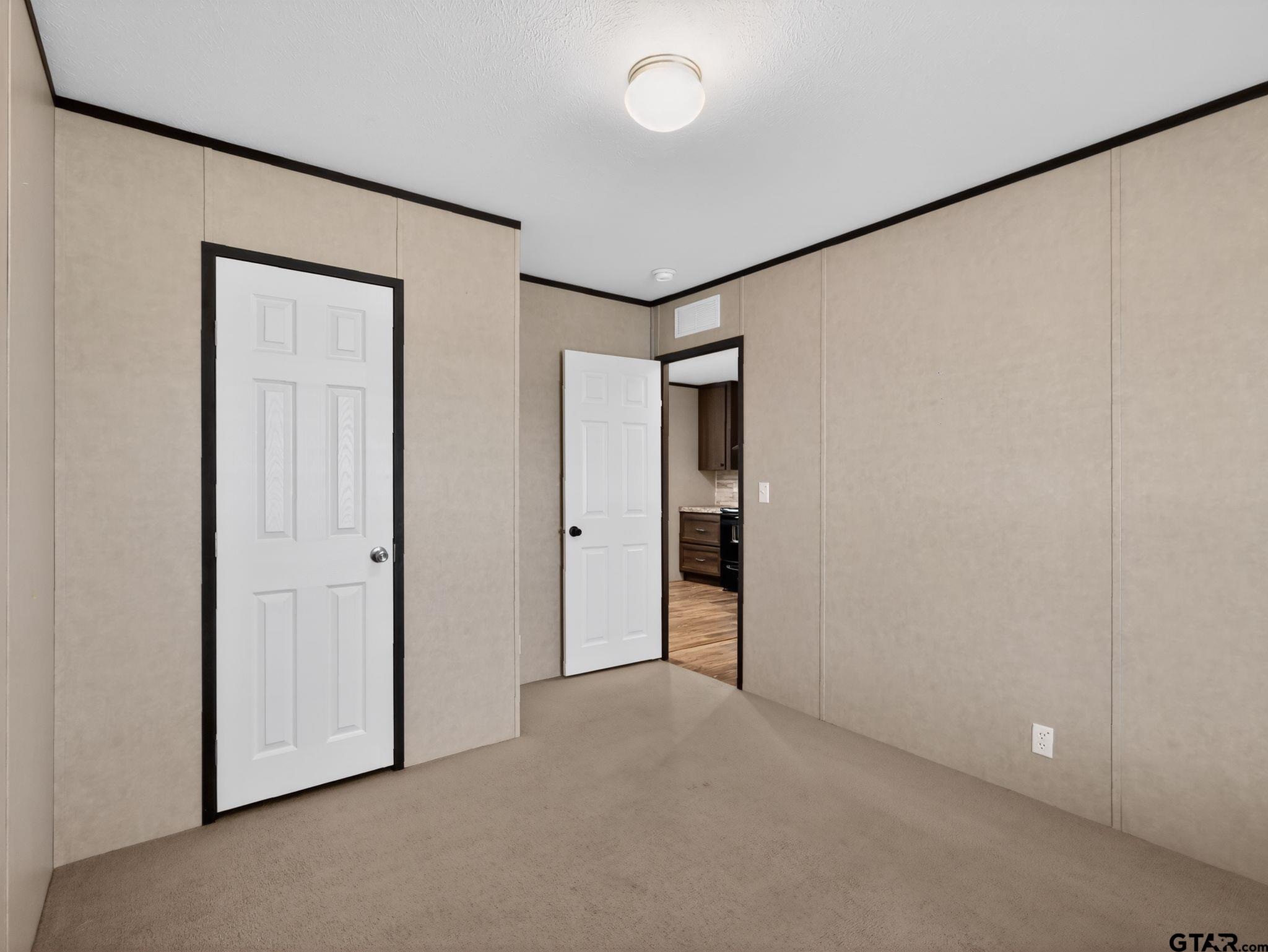 149 Running Bear Quitman, TX 75783 - Photo 24 of 31 a view of an empty room