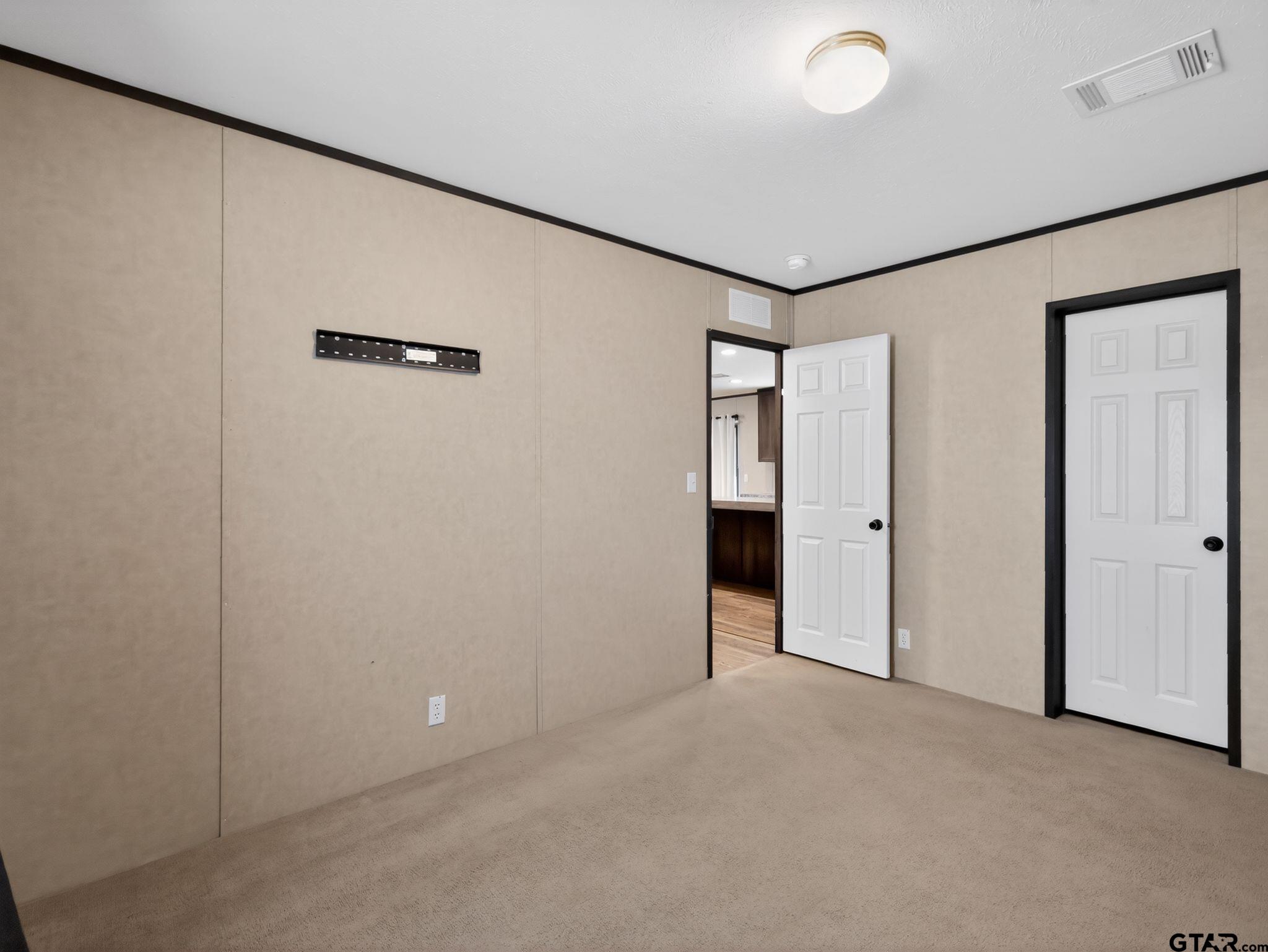 149 Running Bear Quitman, TX 75783 - Photo 27 of 31 a view of a hallway