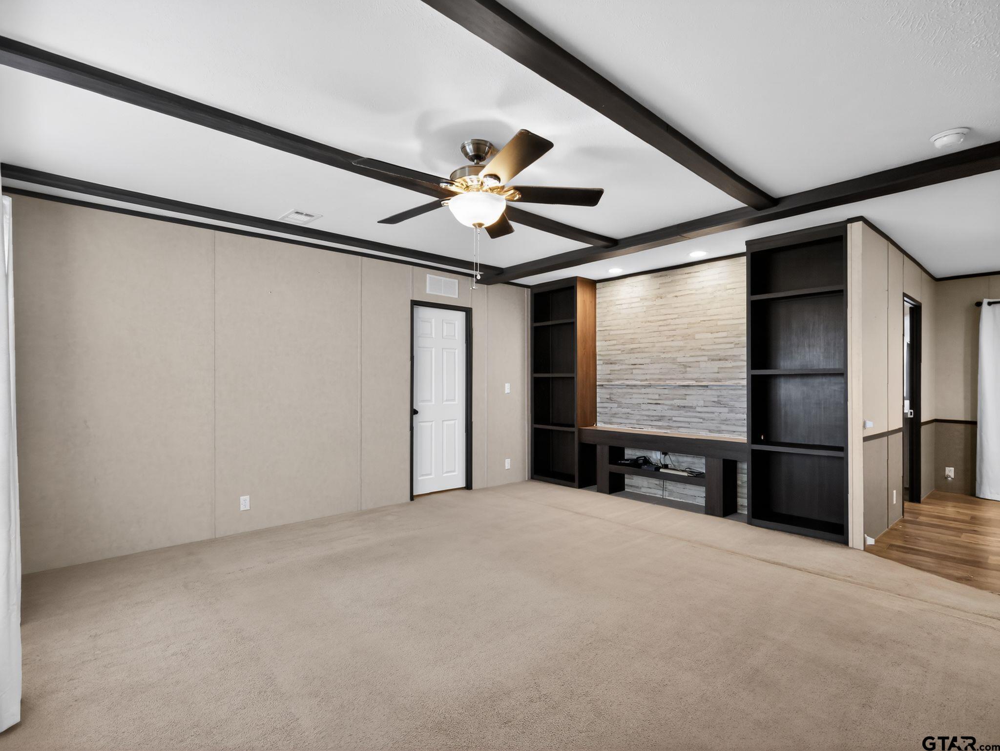 149 Running Bear Quitman, TX 75783 - Photo 4 of 31 a view of empty room with windows