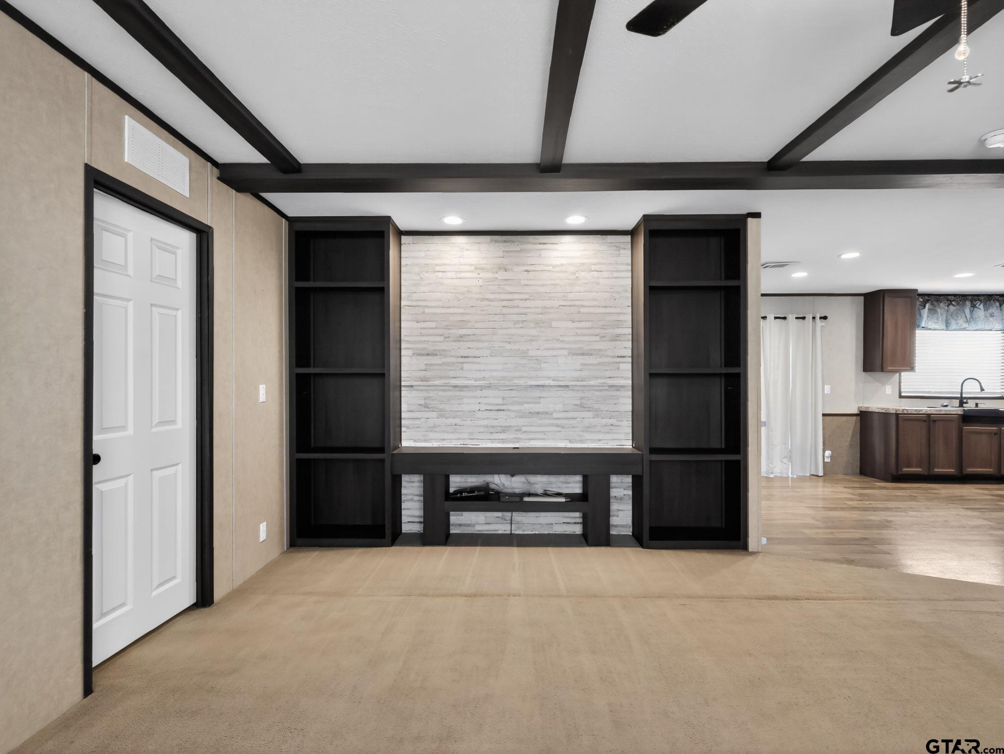 149 Running Bear Quitman, TX 75783 - Photo 5 of 31 a view of kitchen with refrigerator and window