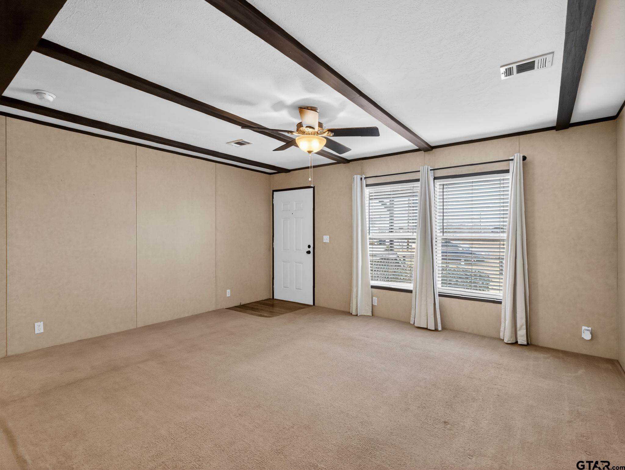 149 Running Bear Quitman, TX 75783 - Photo 6 of 31 a view of an empty room with a window