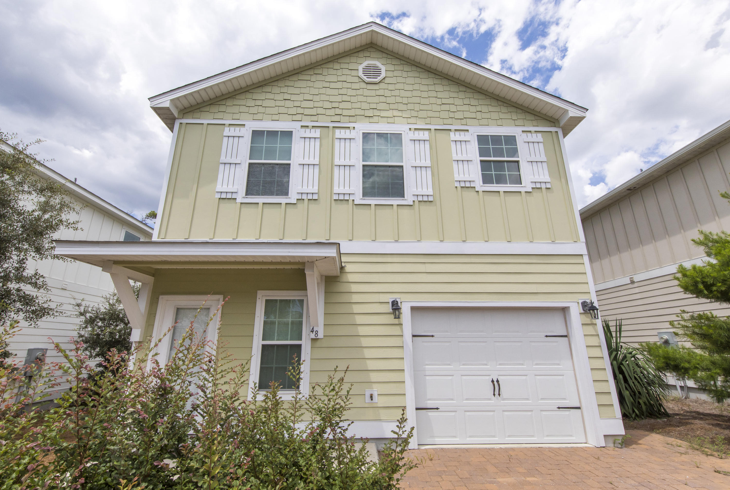 48 Topside Drive Inlet Beach, FL 32461 - Photo 1 of 30 a front view of a house with a yard