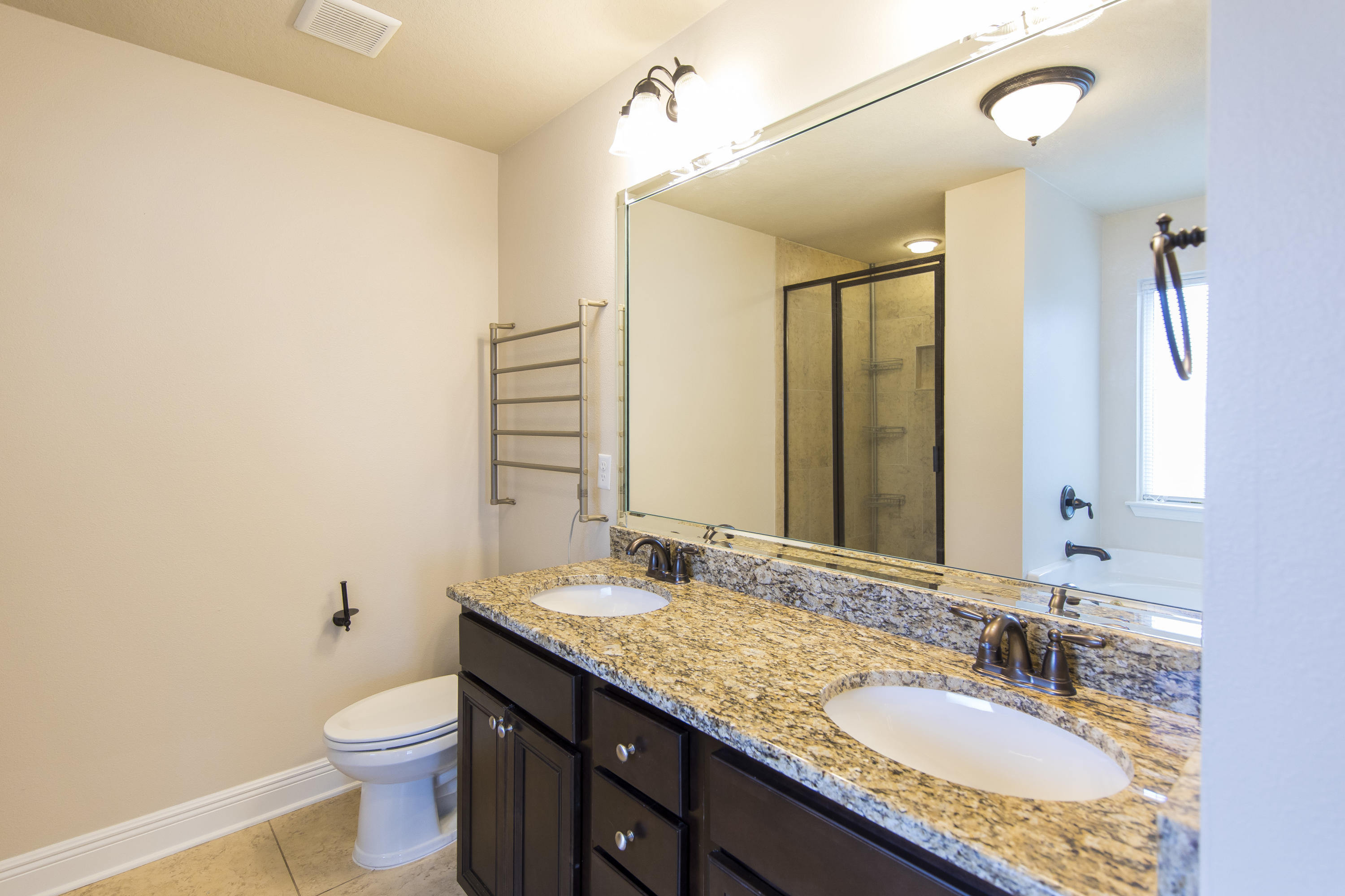 48 Topside Drive Inlet Beach, FL 32461 - Photo 17 of 30 a bathroom with a granite countertop sink and a mirror